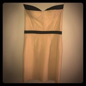 Cream and black corseted strapless dress